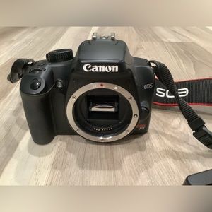 Canon EOS Rebel XS camera body with camera bag